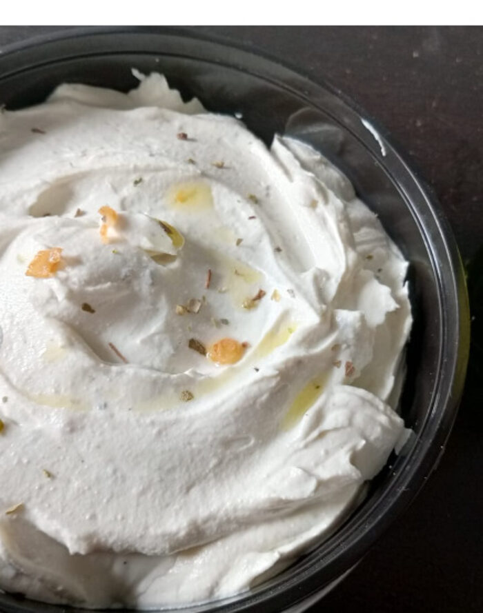 Bowl of Purism garlic and olive oil cream cheese